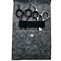 Mina dual felt case open showing elastic compartments