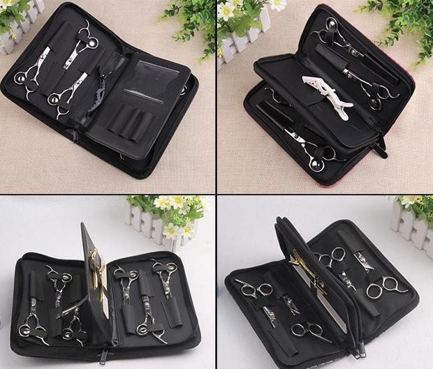 Leather scissors case open showing two zippered compartments