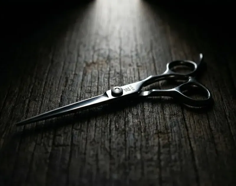 Premium cutting shear close-up on dark wood with professional spotlight
