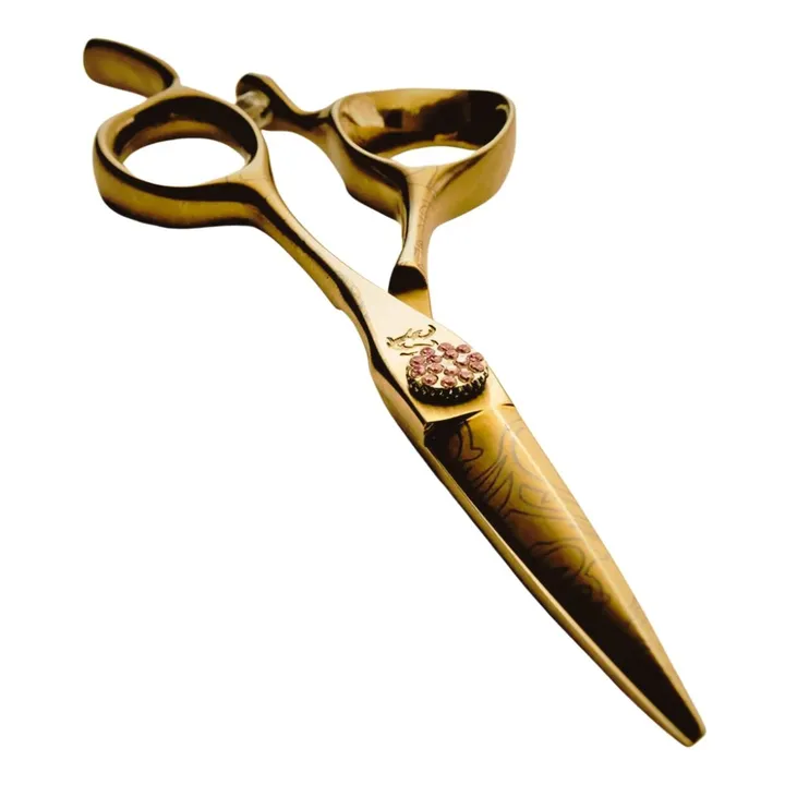 Kamisori Jewel III catalogue image showing a closed gold-toned cutter with fixed rings, a patterned blade and pink pivot decoration.