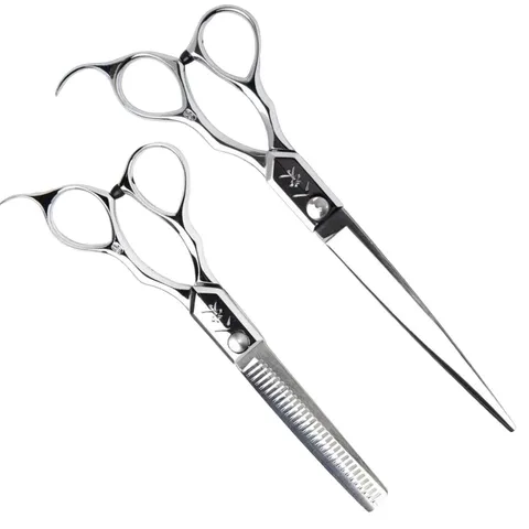 Yasaka barber set: a long cutting scissor beside a thinning scissor.