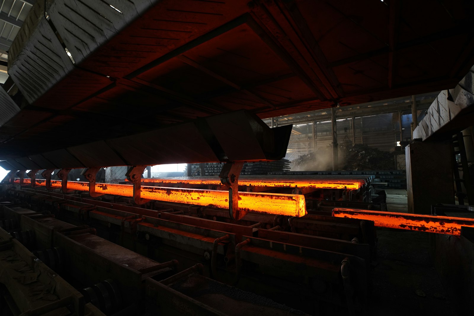 Glowing steel billets inside a forge